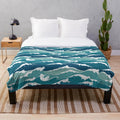 Soft plush cat blanket with blue waves and ocean design