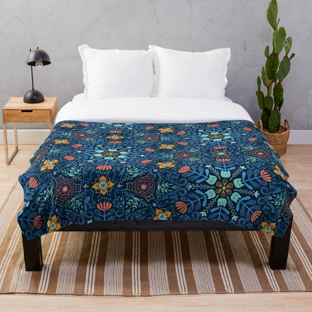 Cats kaleidoscope design on a plush blanket