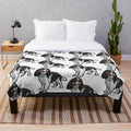 Cavalier King Charles Spaniel curled up on a soft, plush blanket