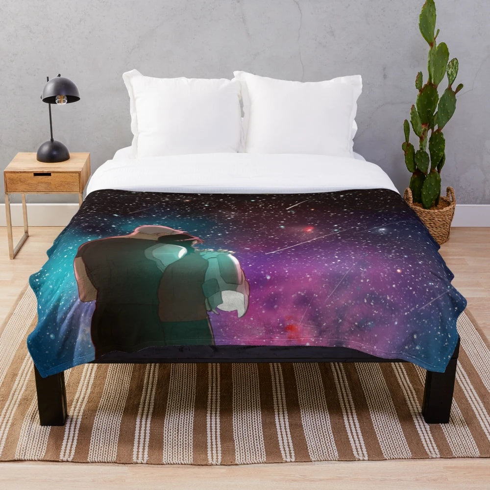 Plush galaxy-themed blanket with a starry night design