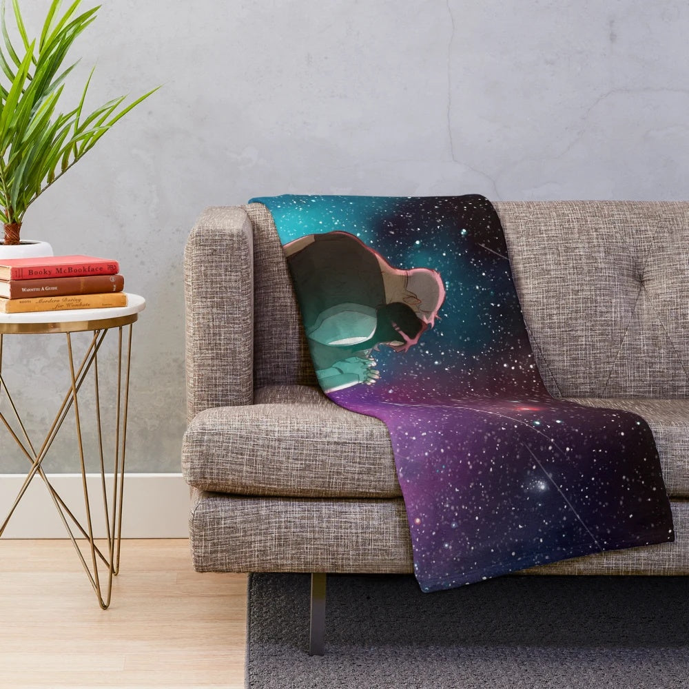 Plush galaxy-themed blanket with a starry night design