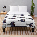 Chain Chomp plush blanket with retro gaming inspired design