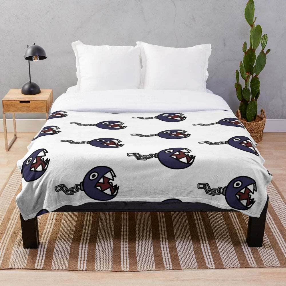 Chain Chomp plush blanket with retro gaming inspired design