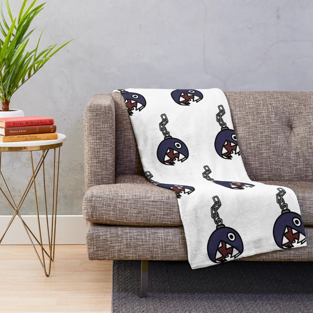 Chain Chomp plush blanket with retro gaming inspired design