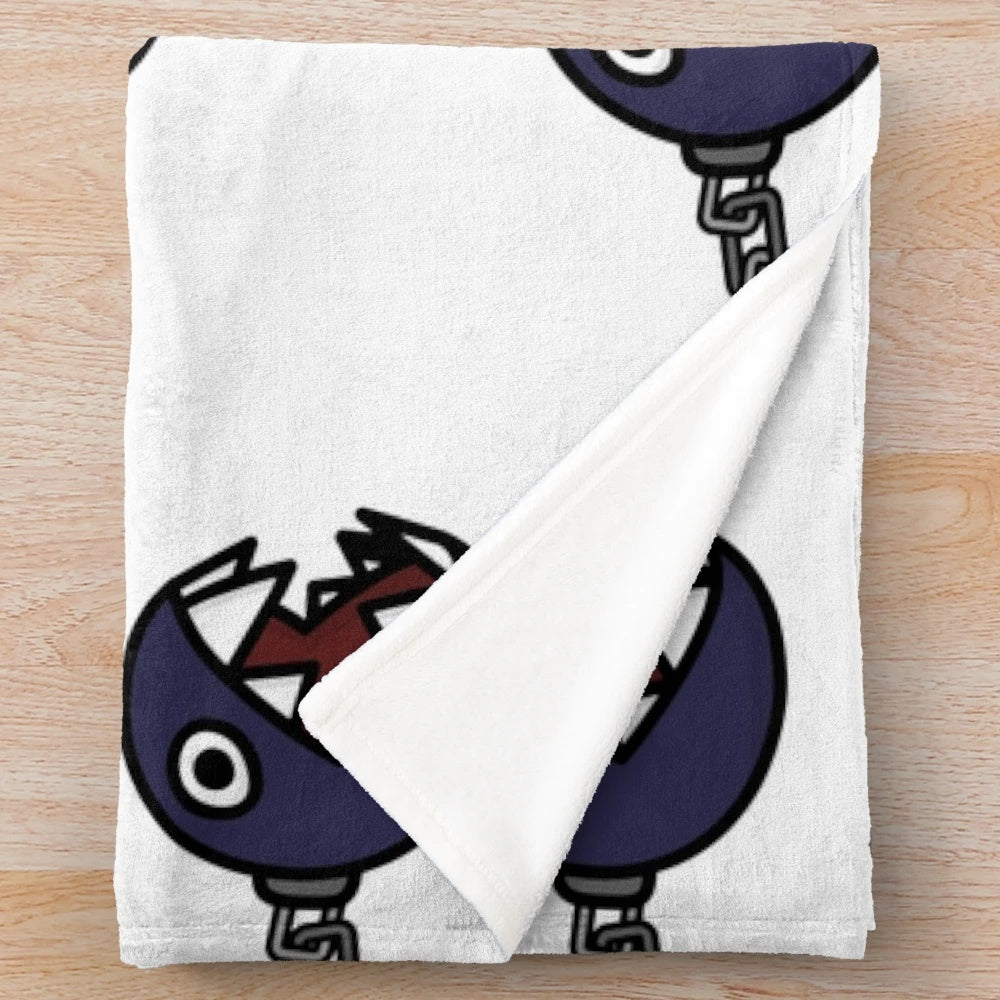 Chain Chomp plush blanket with retro gaming inspired design
