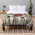 Charles Rennie Mackintosh inspired plush blanket with floral pattern