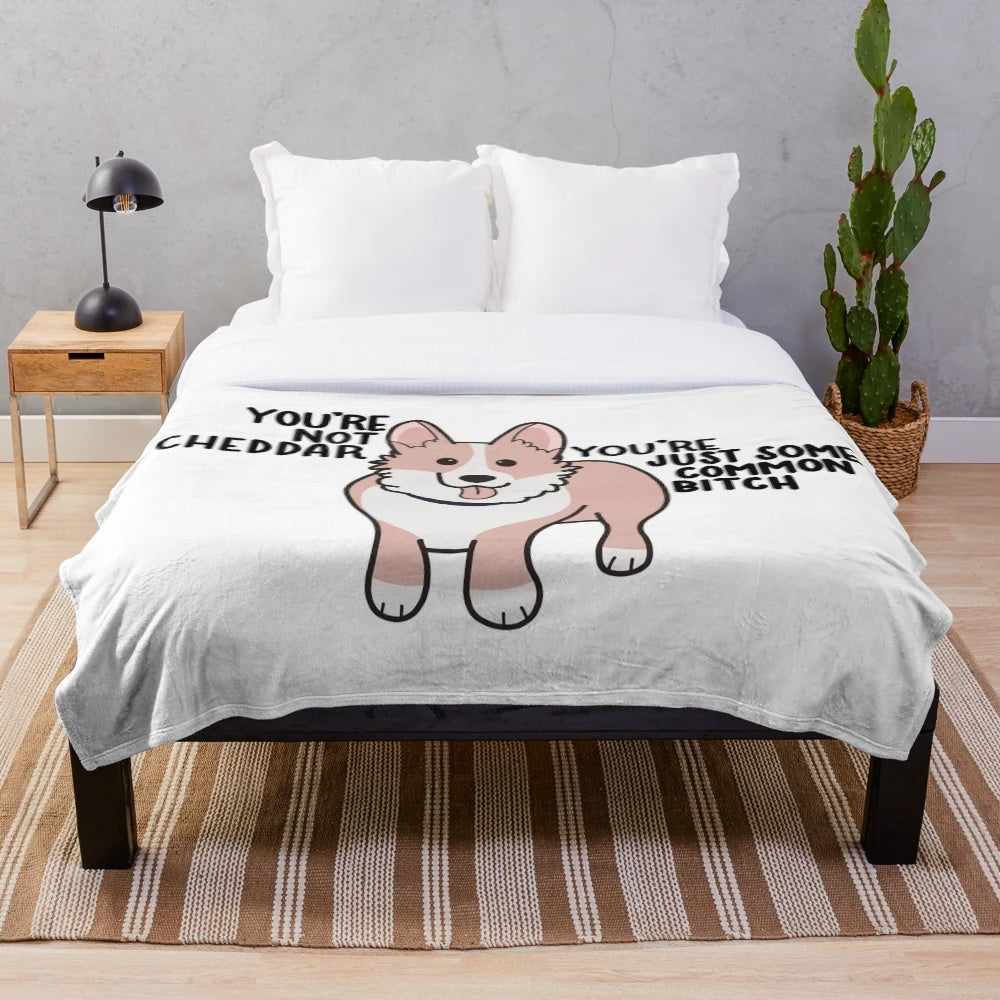 Soft, cuddly plush blanket featuring a cheddar-colored corgi, inspired by the TV show Brooklyn Nine-Nine