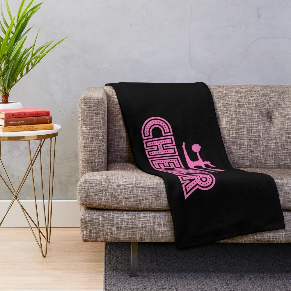 Cheerleading-themed plush blanket in vibrant colors