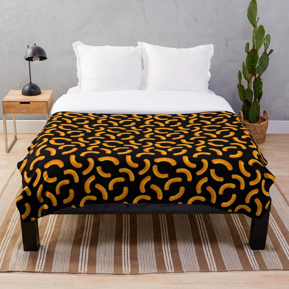 Cheeto-inspired orange patterned plush blanket