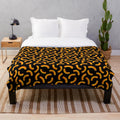 Cheeto-inspired orange patterned plush blanket
