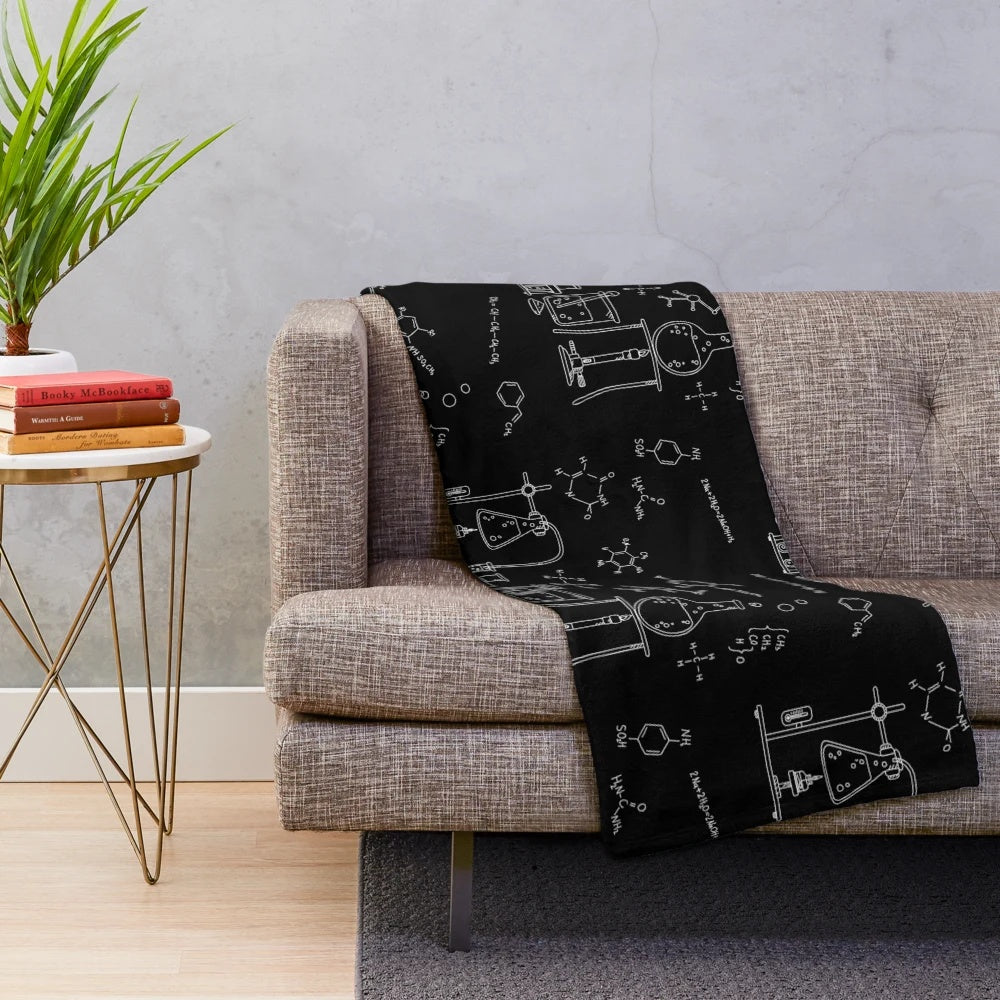 Chemistry plush blanket featuring molecular and scientific patterns