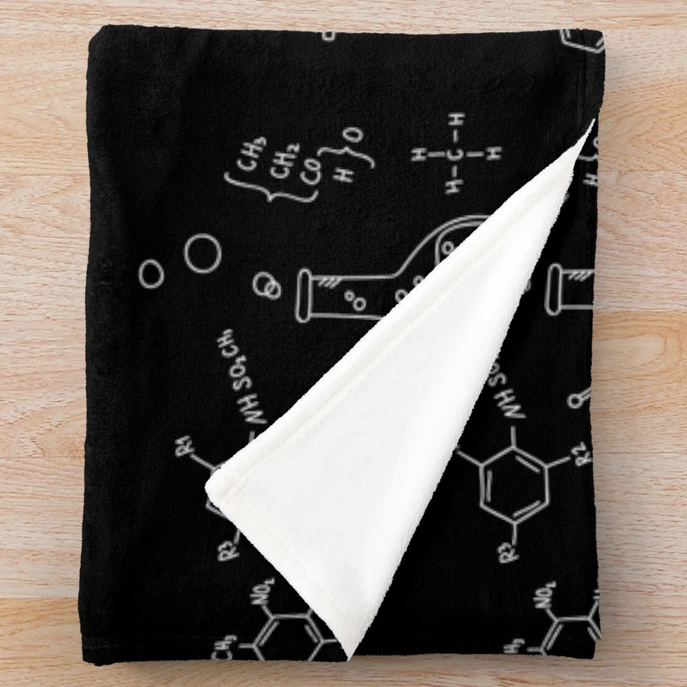 Chemistry plush blanket featuring molecular and scientific patterns