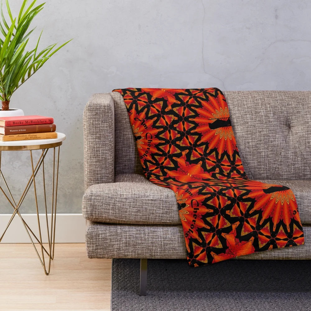 Cherokee-inspired plush blanket with tribal design