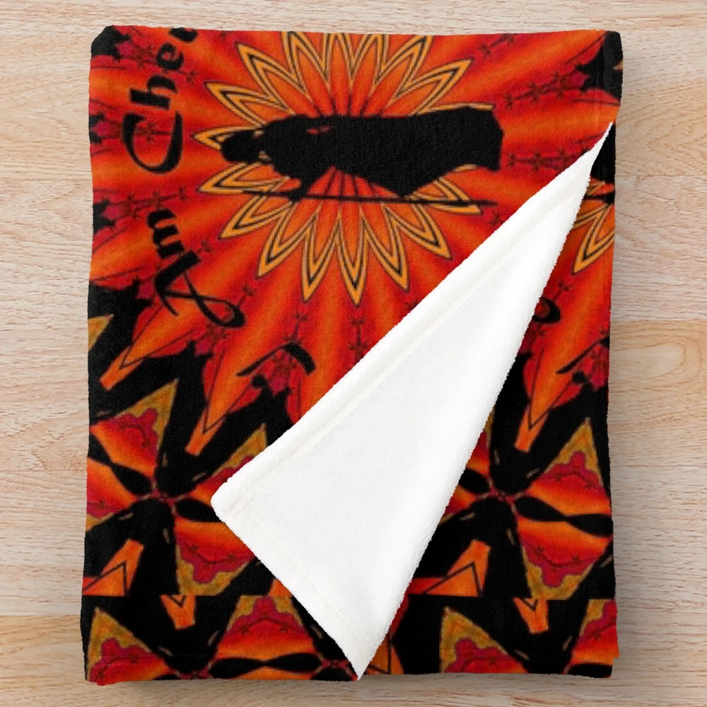 Cherokee-inspired plush blanket with tribal design