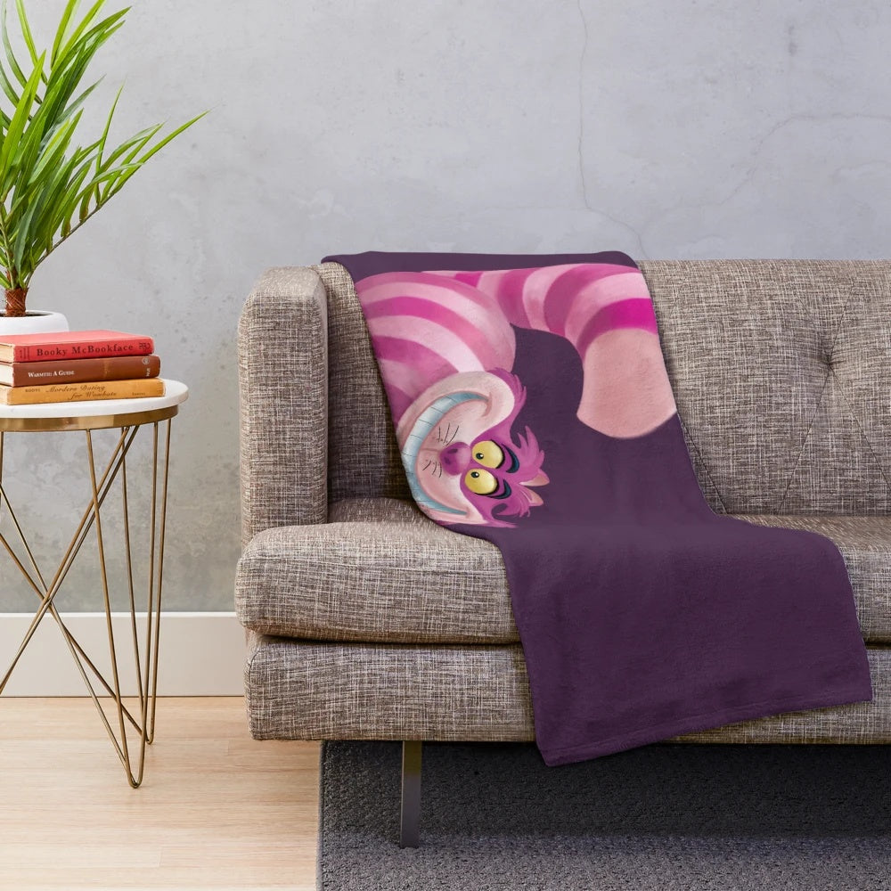 Cheshire Cat design plush blanket for a cozy Alice in Wonderland inspired home
