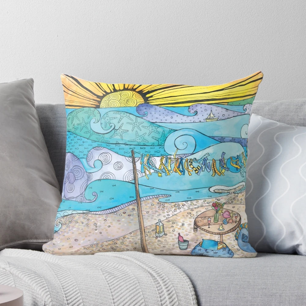 Coastal-inspired decorative pillow featuring an ocean and beach scene