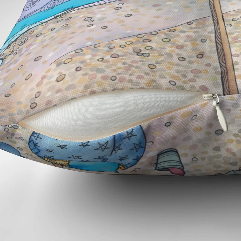 Coastal-inspired decorative pillow featuring an ocean and beach scene