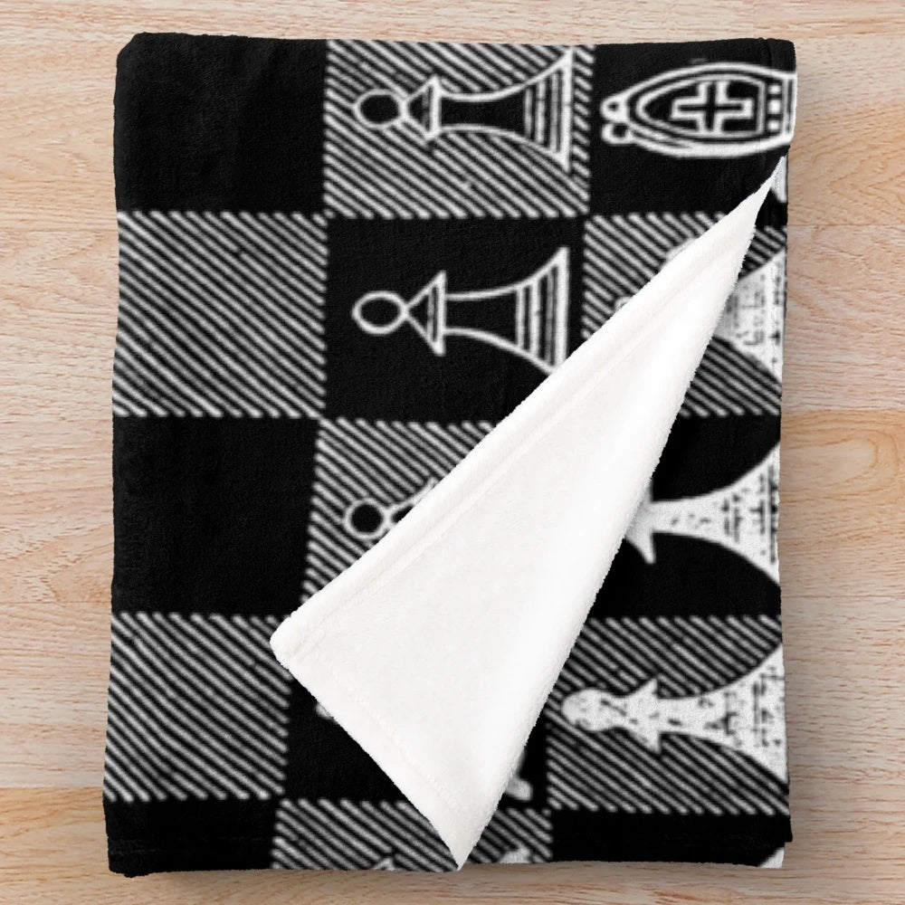 Plush white blanket with chess pattern design, ideal for chess fans and players