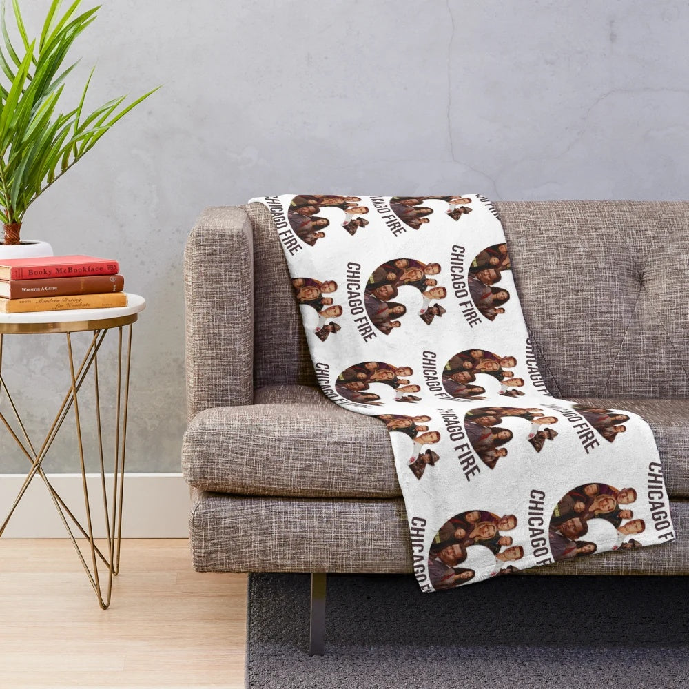 Chicago Fire themed plush blanket with cast logo design