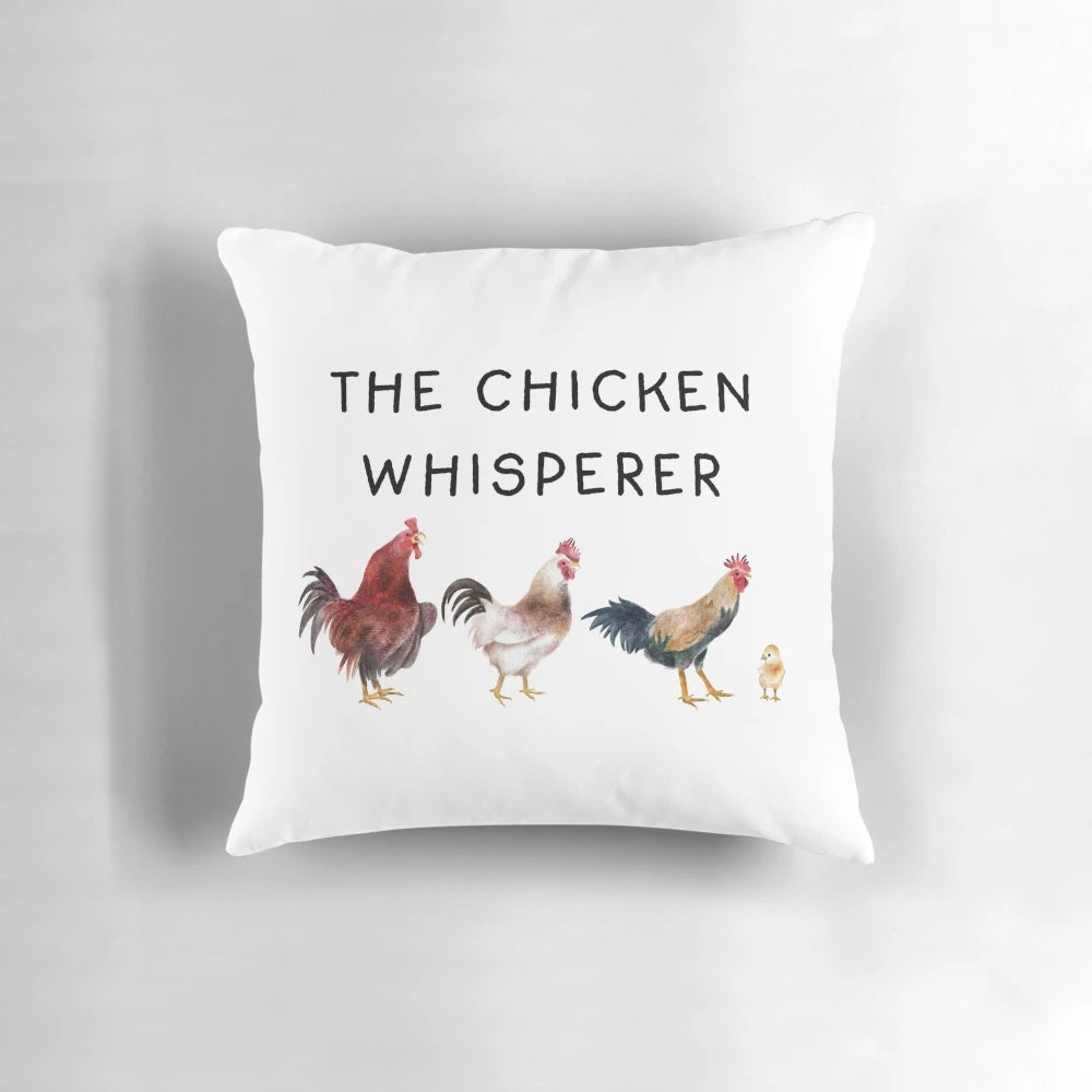 Watercolor illustration of a chicken on a soft, cozy pillow with a "Chicken Whisperer" design for farmhouse-inspired home decor.
