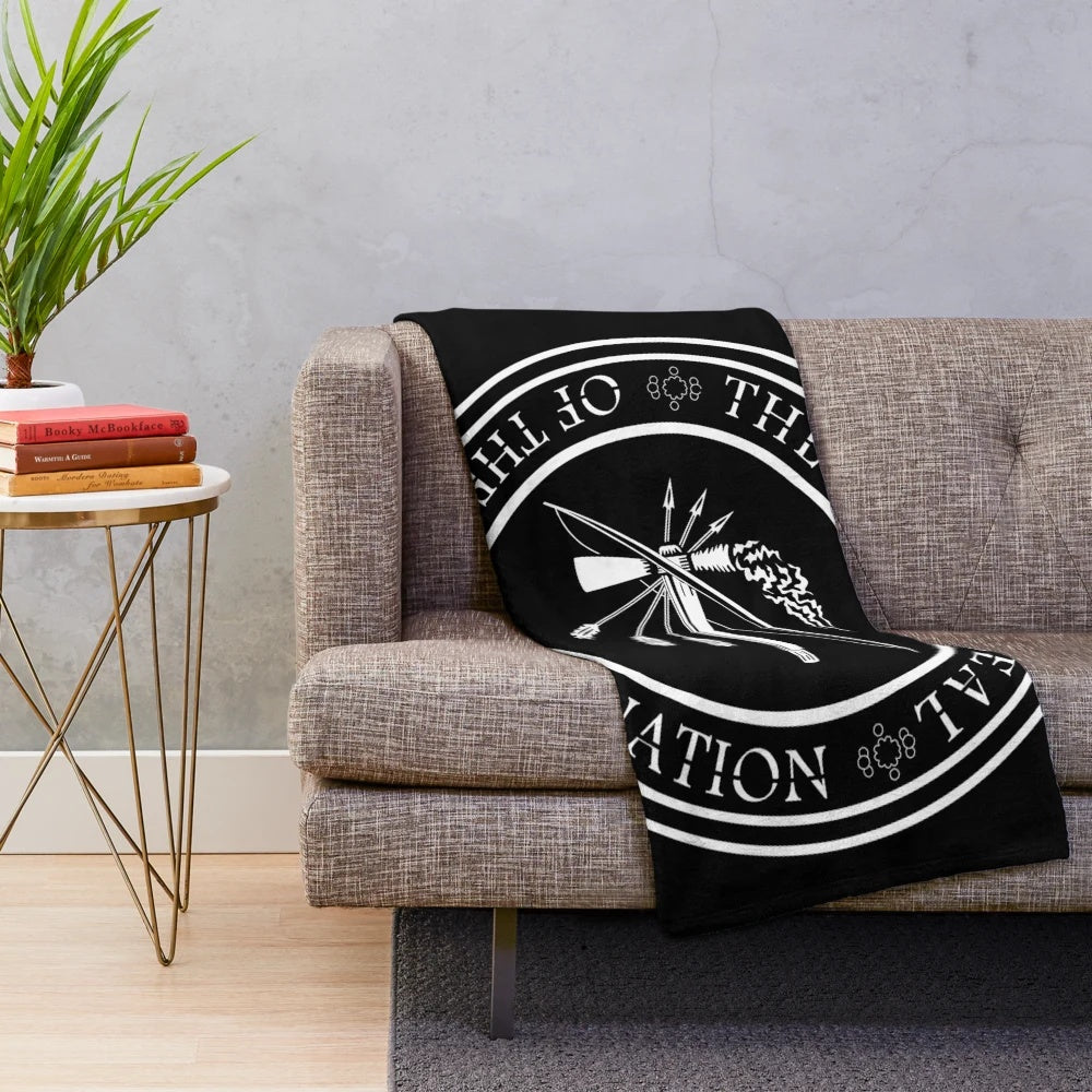 Choctaw inspired plush blanket with tribal seal design