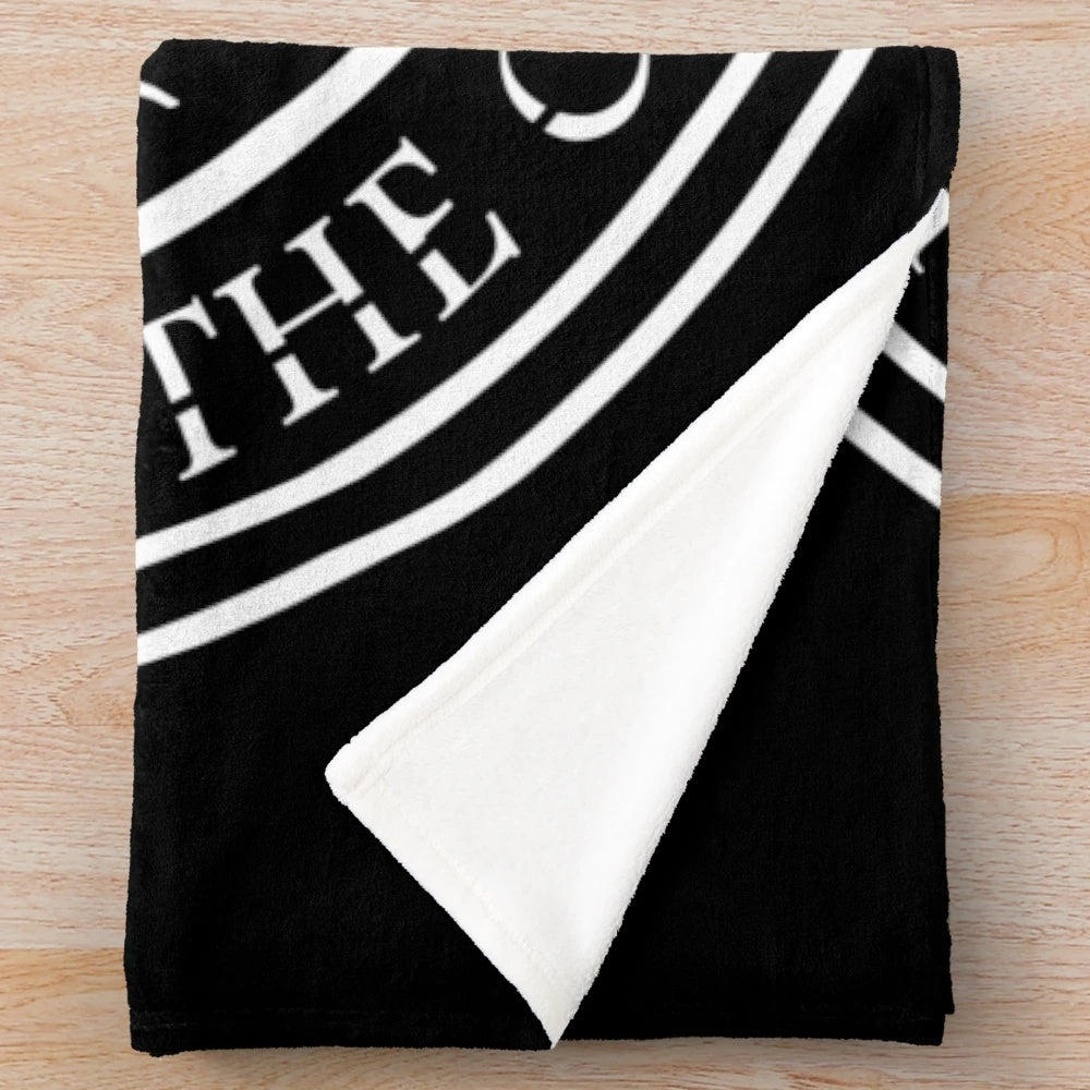 Choctaw inspired plush blanket with tribal seal design