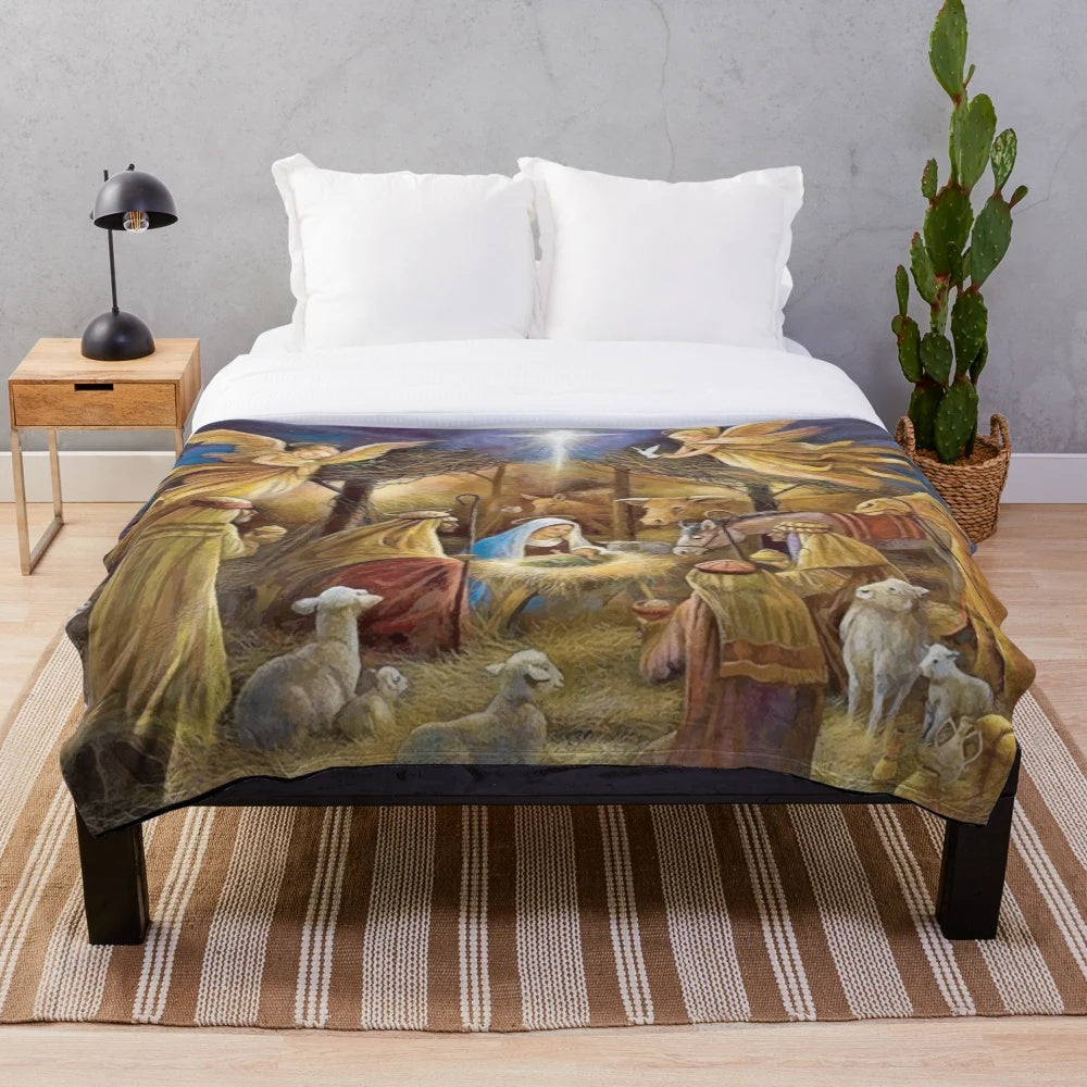 Soft and snuggly plush blanket featuring a nativity scene design