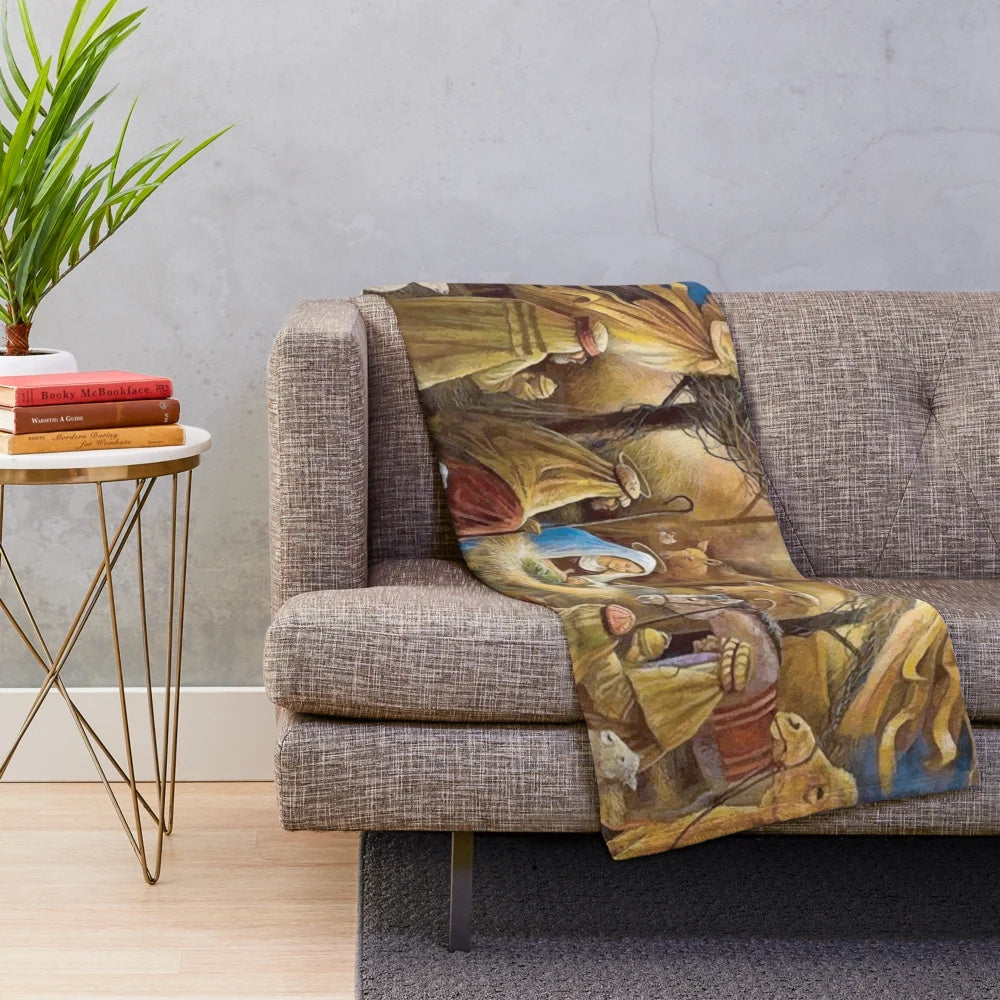 Soft and snuggly plush blanket featuring a nativity scene design