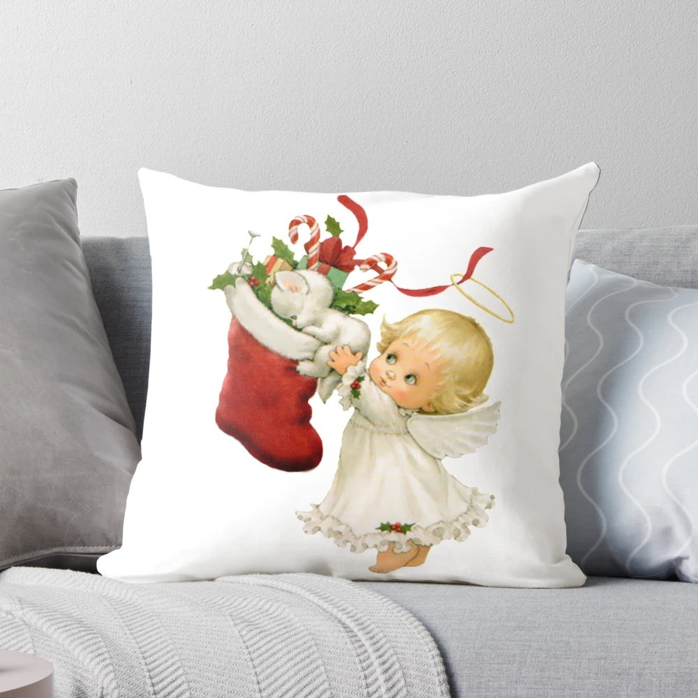A soft, white Christmas angel pillow with a cuddly kitten design, perfect for festive holiday home decor.
