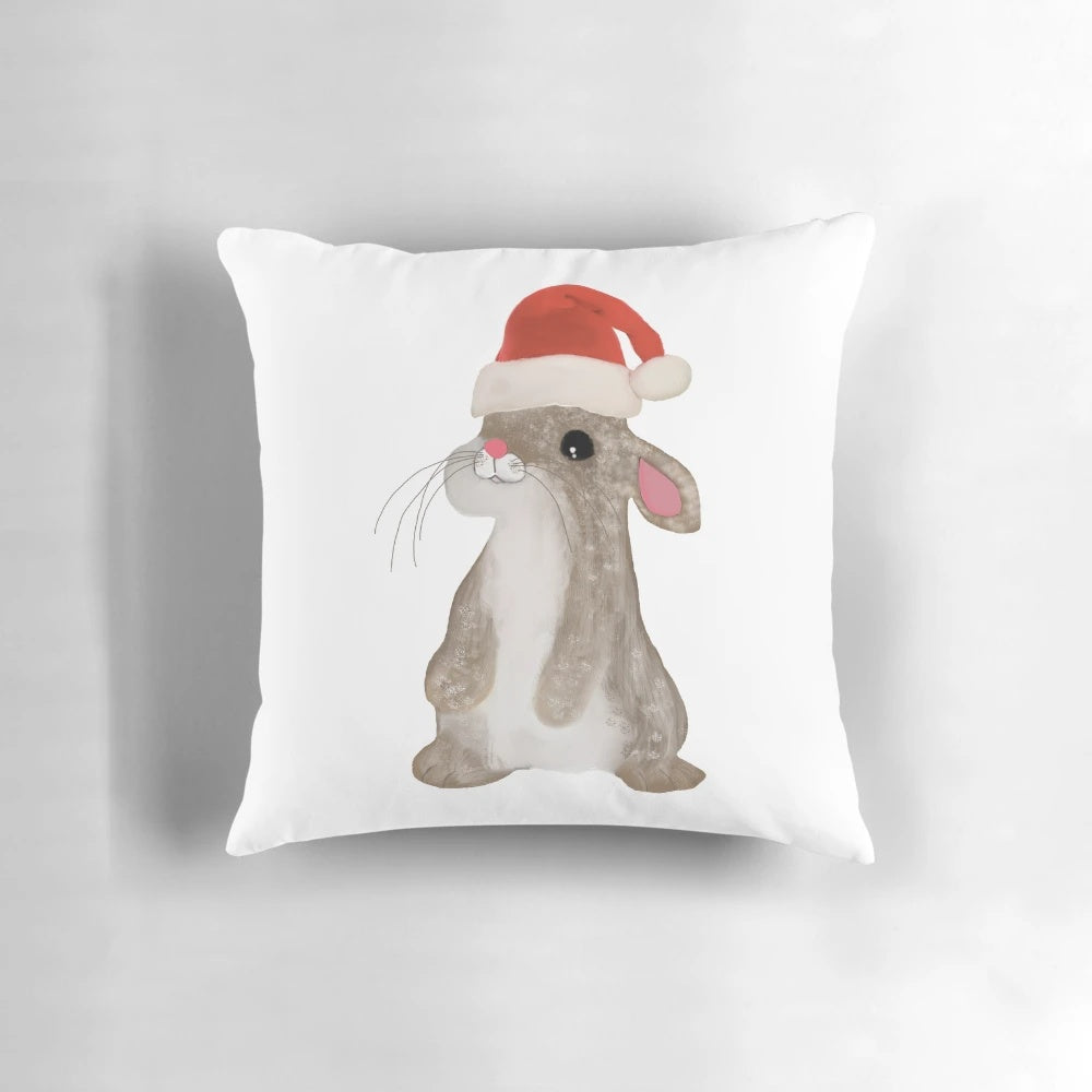 Soft, plush Christmas bunny pillow with Santa hat and sweater design