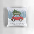 A red car carrying a Christmas tree on its roof, surrounded by snow and Christmas decorations, featured on a plush, personalized pillow.
