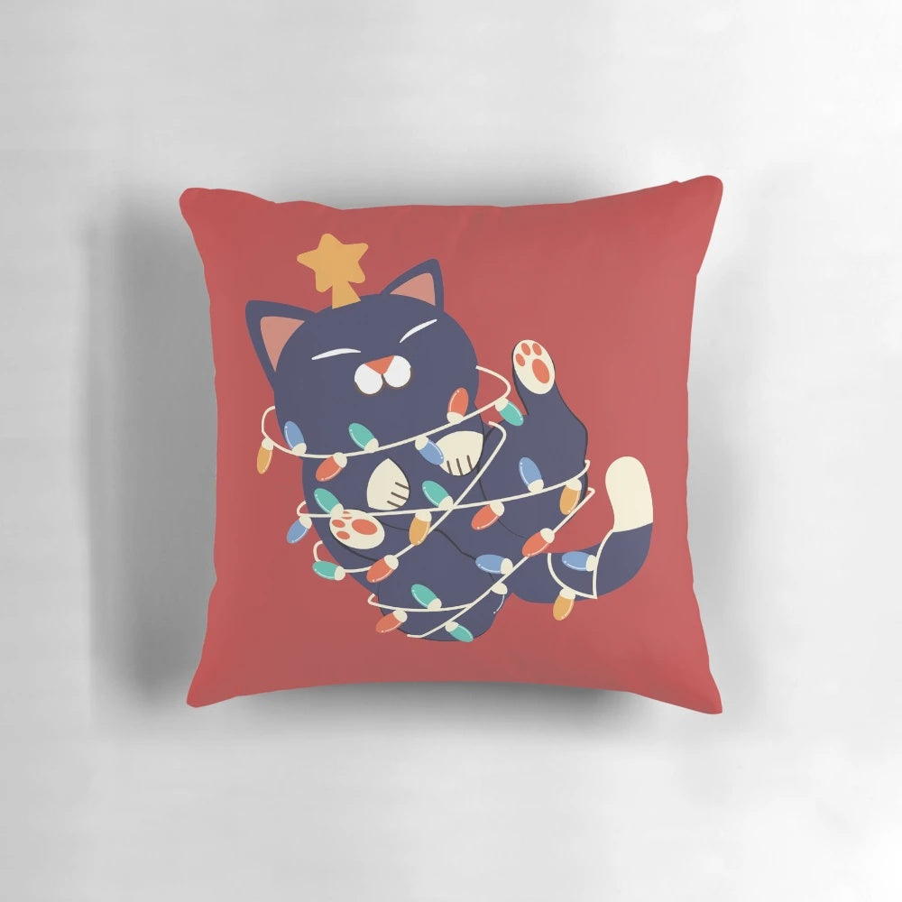 Festive Christmas cat pillow with twinkling lights and a cute feline friend