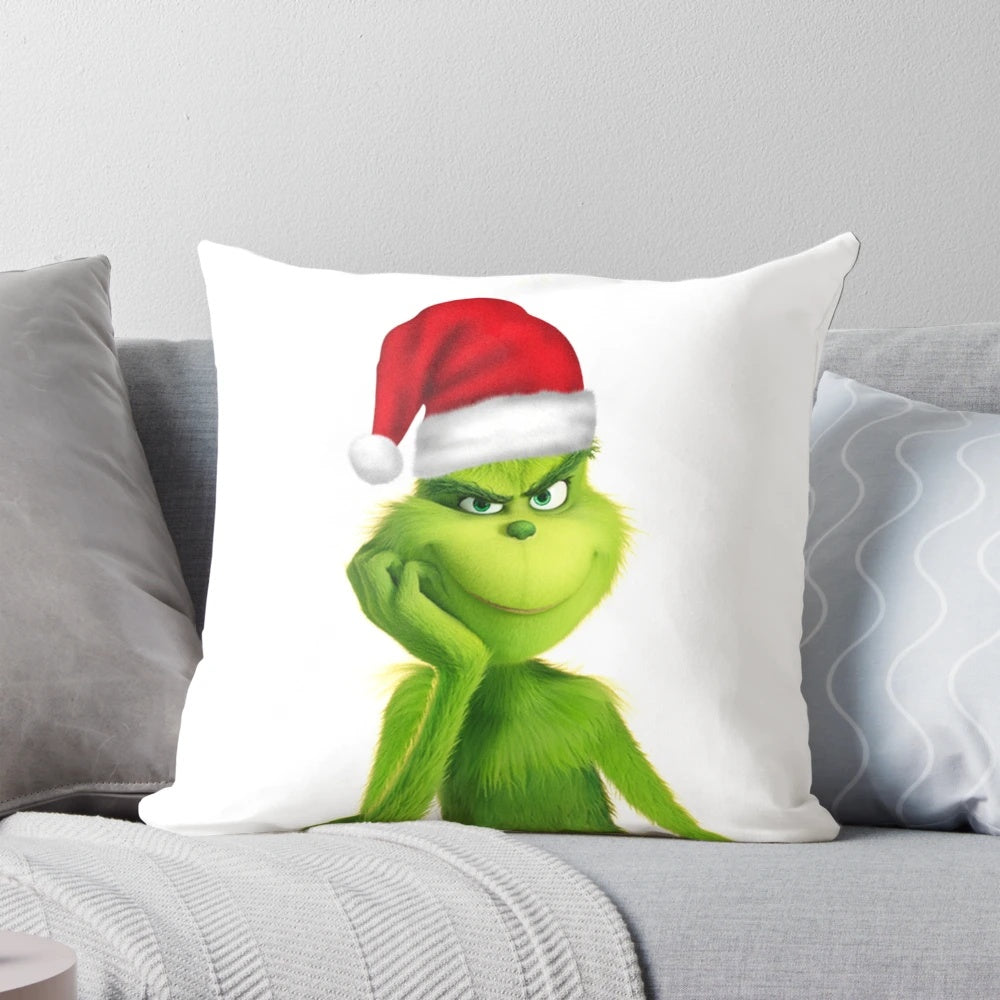 Soft, cuddly Grinch plush pillow perfect for Christmas and holiday decor