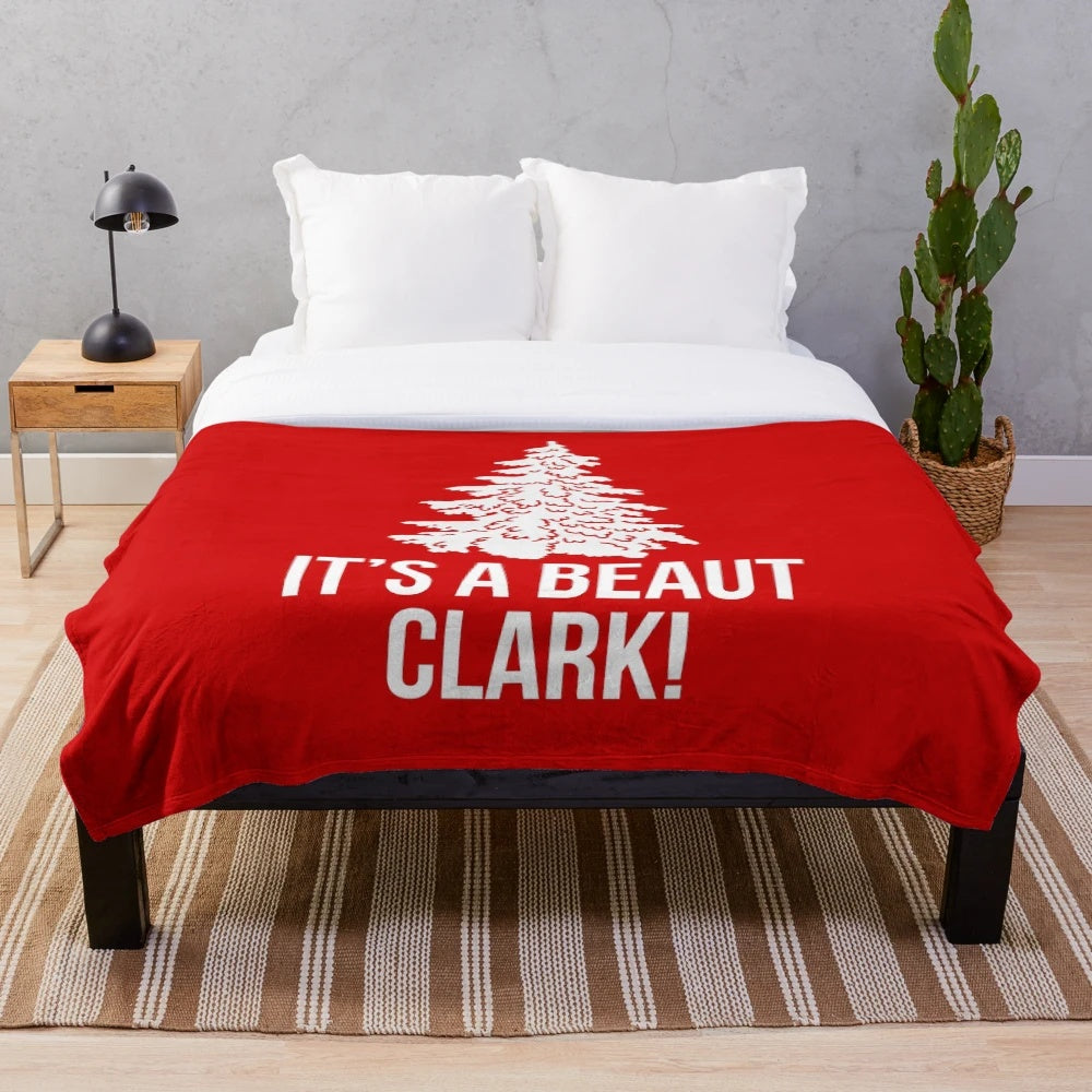 Cozy plush blanket with classic Christmas movie design