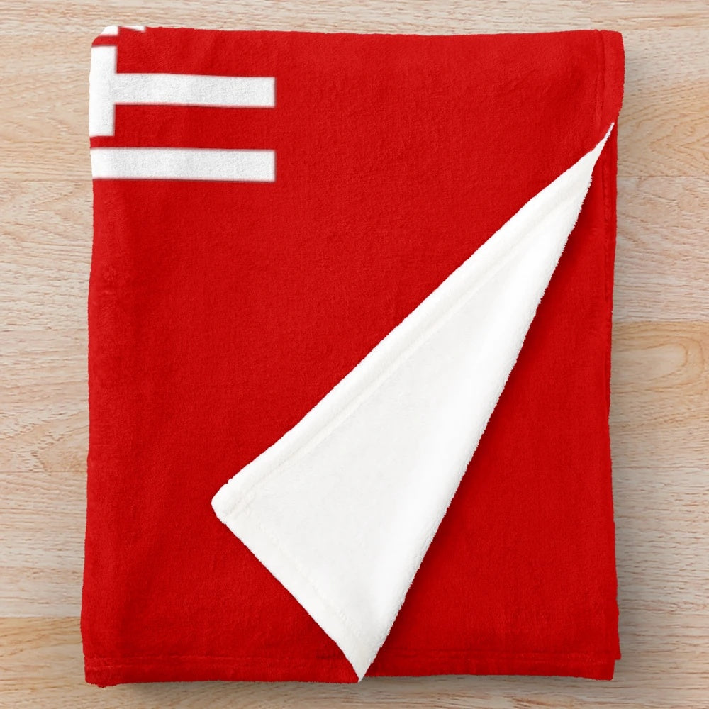 Cozy plush blanket with classic Christmas movie design