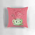 Cozy Christmas-themed pillow featuring hot chocolate, candy canes, and festive decorations