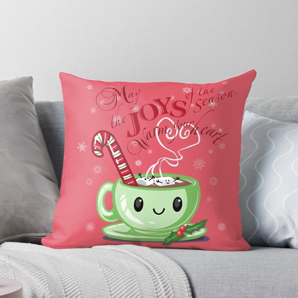 Cozy Christmas-themed pillow featuring hot chocolate, candy canes, and festive decorations
