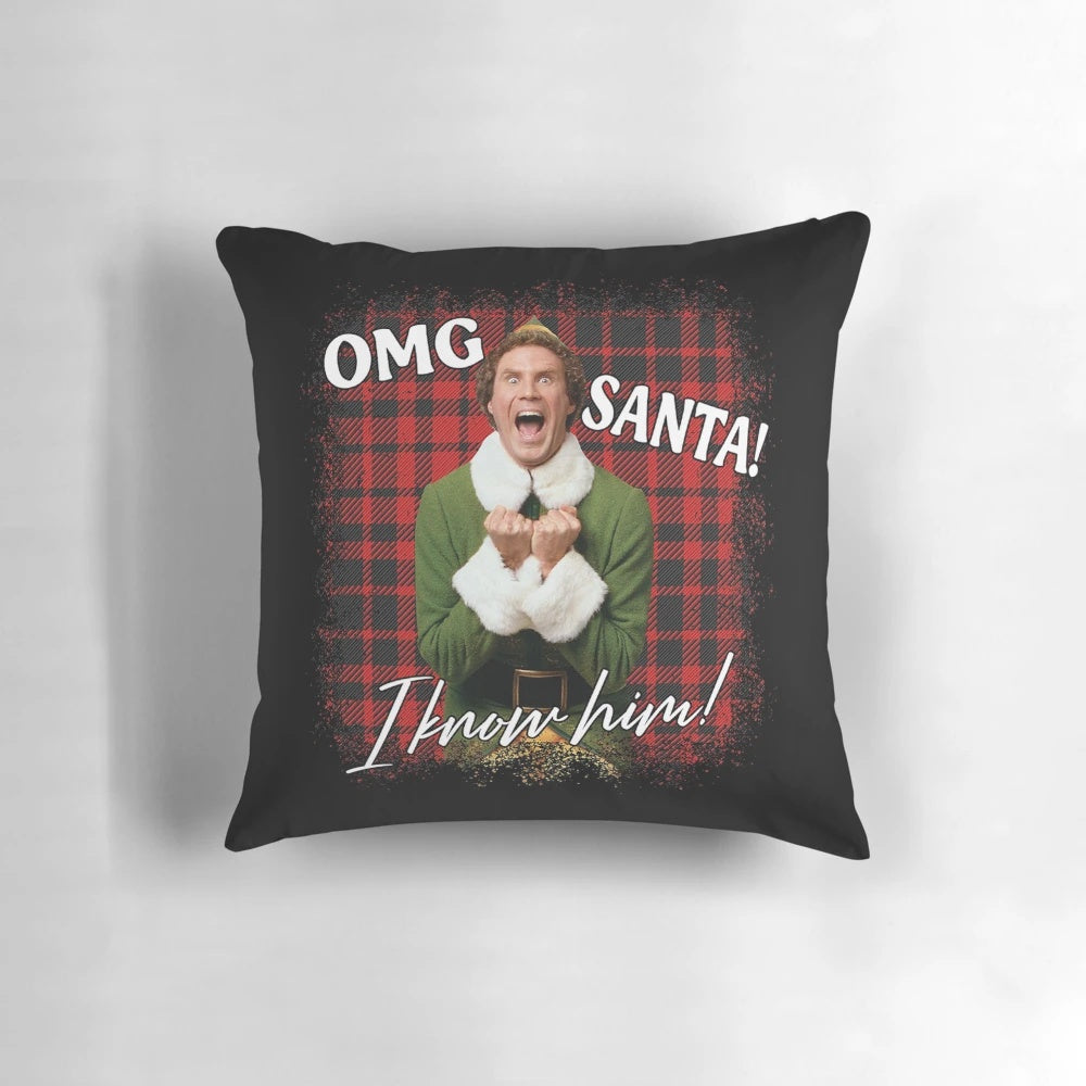 A white square pillow with a humorous "OMG Santa! I know him!" design, inspired by the popular Christmas movie "Elf