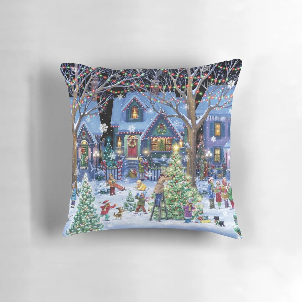 Decorative Christmas pillow with snowy winter landscape and holiday elements