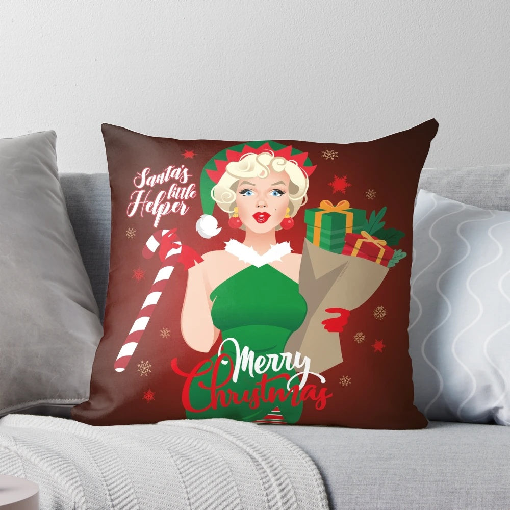 Decorative Christmas pillow featuring a blonde Marilyn Monroe-inspired figure in a Santa's helper outfit