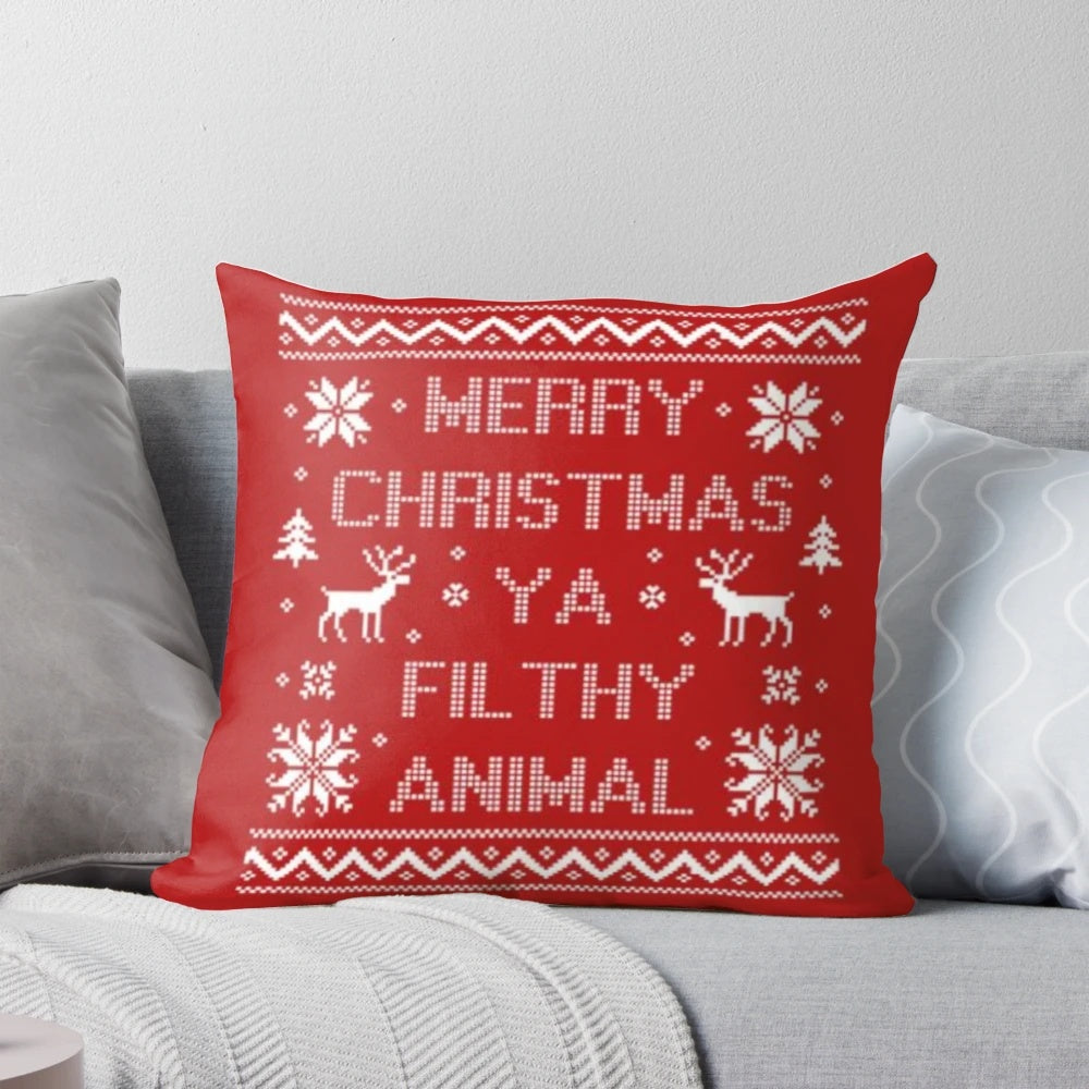 Soft, plush Christmas pillow featuring the quote "Merry Christmas ya filthy animal" from the popular holiday film Home Alone.