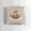 Soft, plush Christmas pudding-shaped pillow with holly berries and pink icing, perfect for holiday decor.