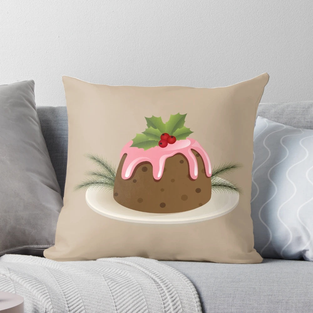 Soft, plush Christmas pudding-shaped pillow with holly berries and pink icing, perfect for holiday decor.