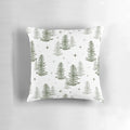 A cozy Christmas throw pillow featuring a minimalist design of a winter forest scene with trees, a star, and a warm, neutral color palette.