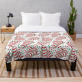 Plush blanket featuring a Christmas tree made of Little Debbie snack cakes