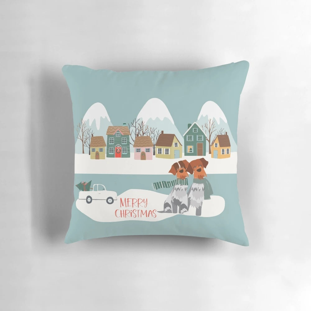 Festive Christmas village scene printed on a soft, plush pillow