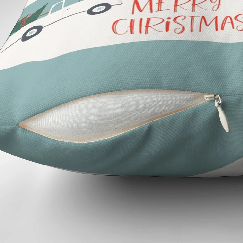Festive Christmas village scene printed on a soft, plush pillow