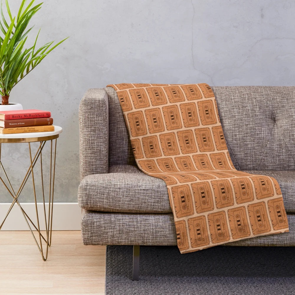 Plush cinema-themed cassette blanket with retro design