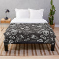 Plush blanket with retro movie-themed design