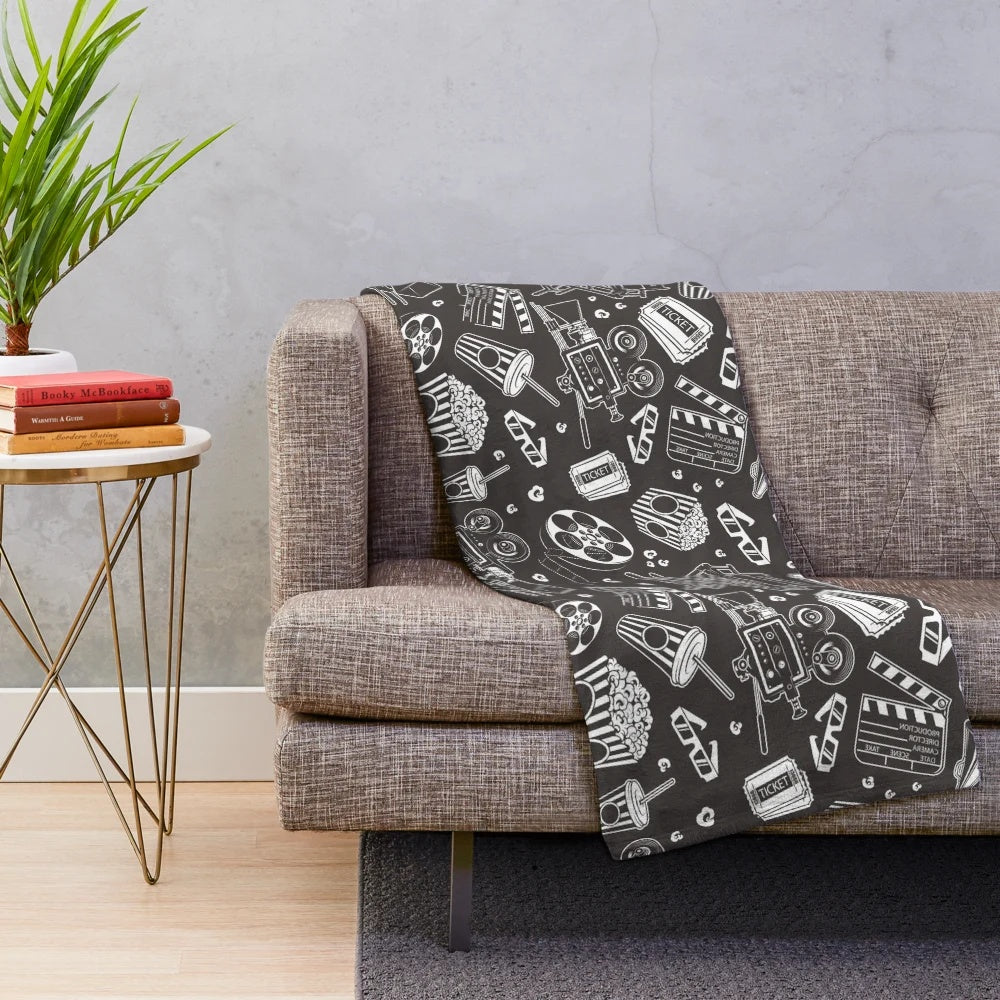 Plush blanket with retro movie-themed design